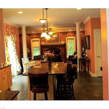 Kitchen looking into the living room - Custom porcelain tile and granite counter top with two 10"  w