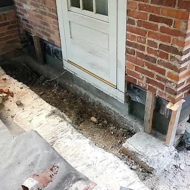 Plastering and flashing in around doorway