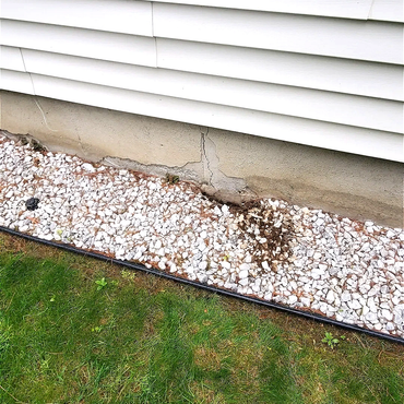 Existing foundation plaster flaking and in need of an upgrade