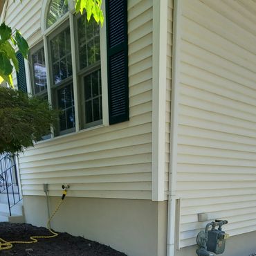Finished plastered concrete foundation using a 2 coat system