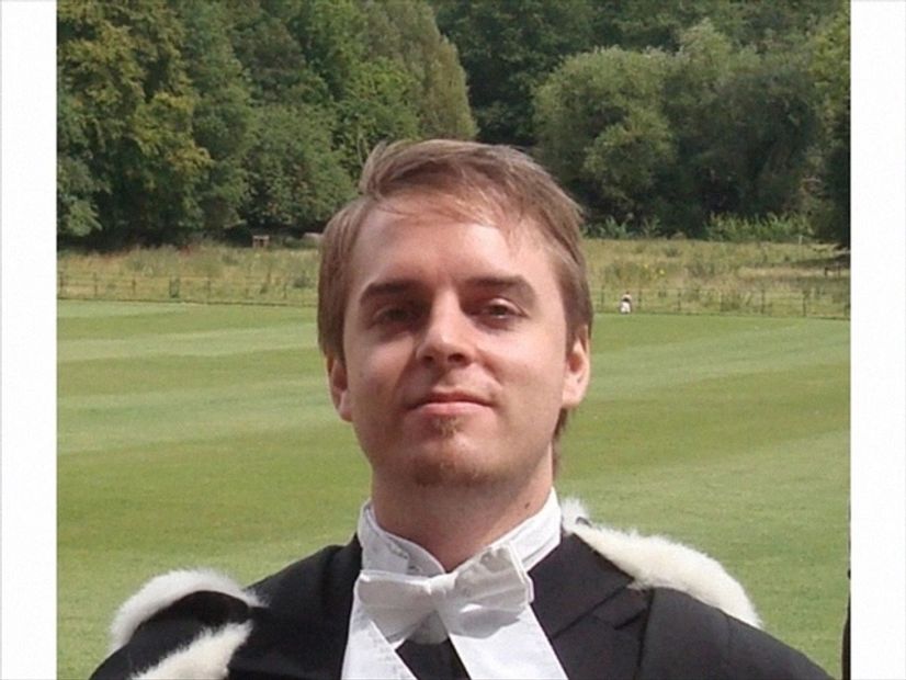 Cambridge maths tutor online Chemistry tutor and online physics tutor standing outside Cambridge.