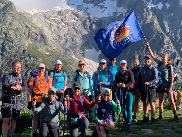 Group of people hiking in the alps