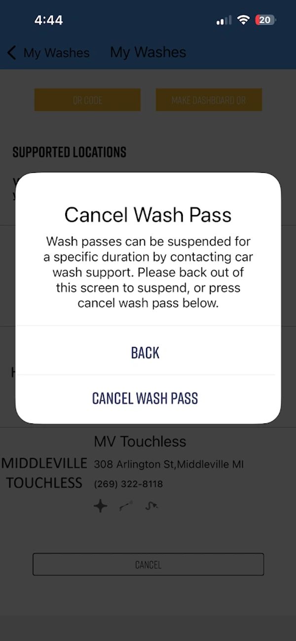 App screen prompting to cancel a car wash pass with options to go back or cancel.