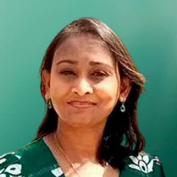 Portrait of a woman with a subtle smile.