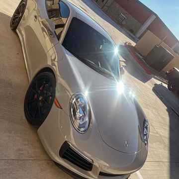 Shiny silver Porsche 911 received our one-step paint correction