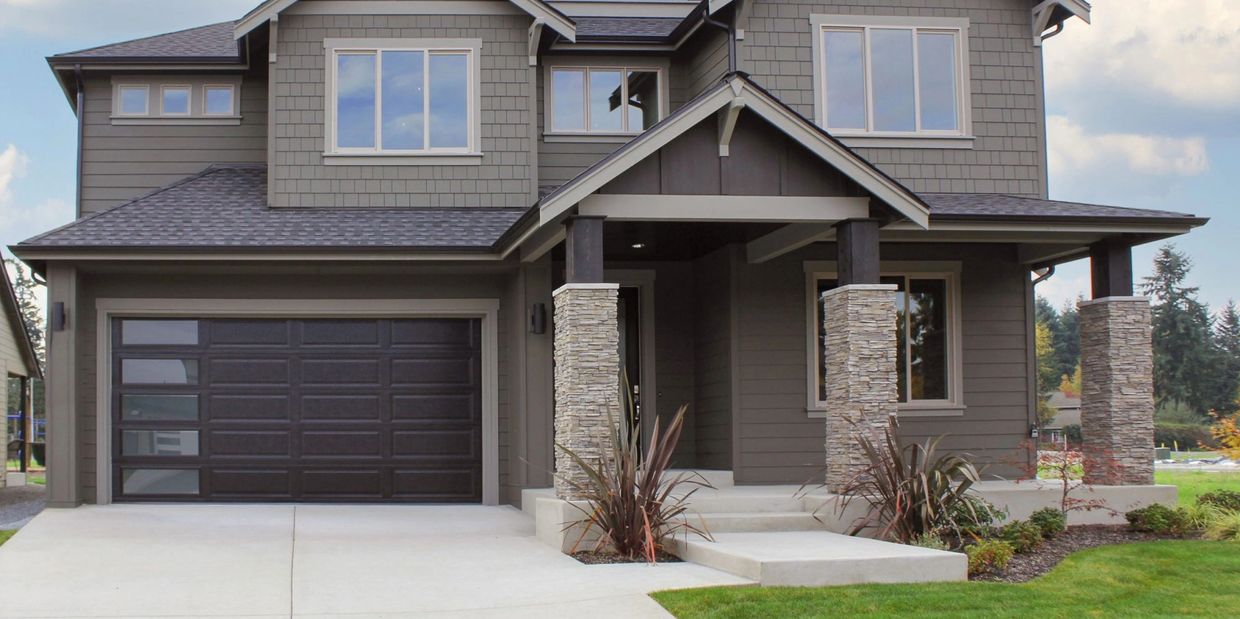 beautiful home with a beautiful garage door