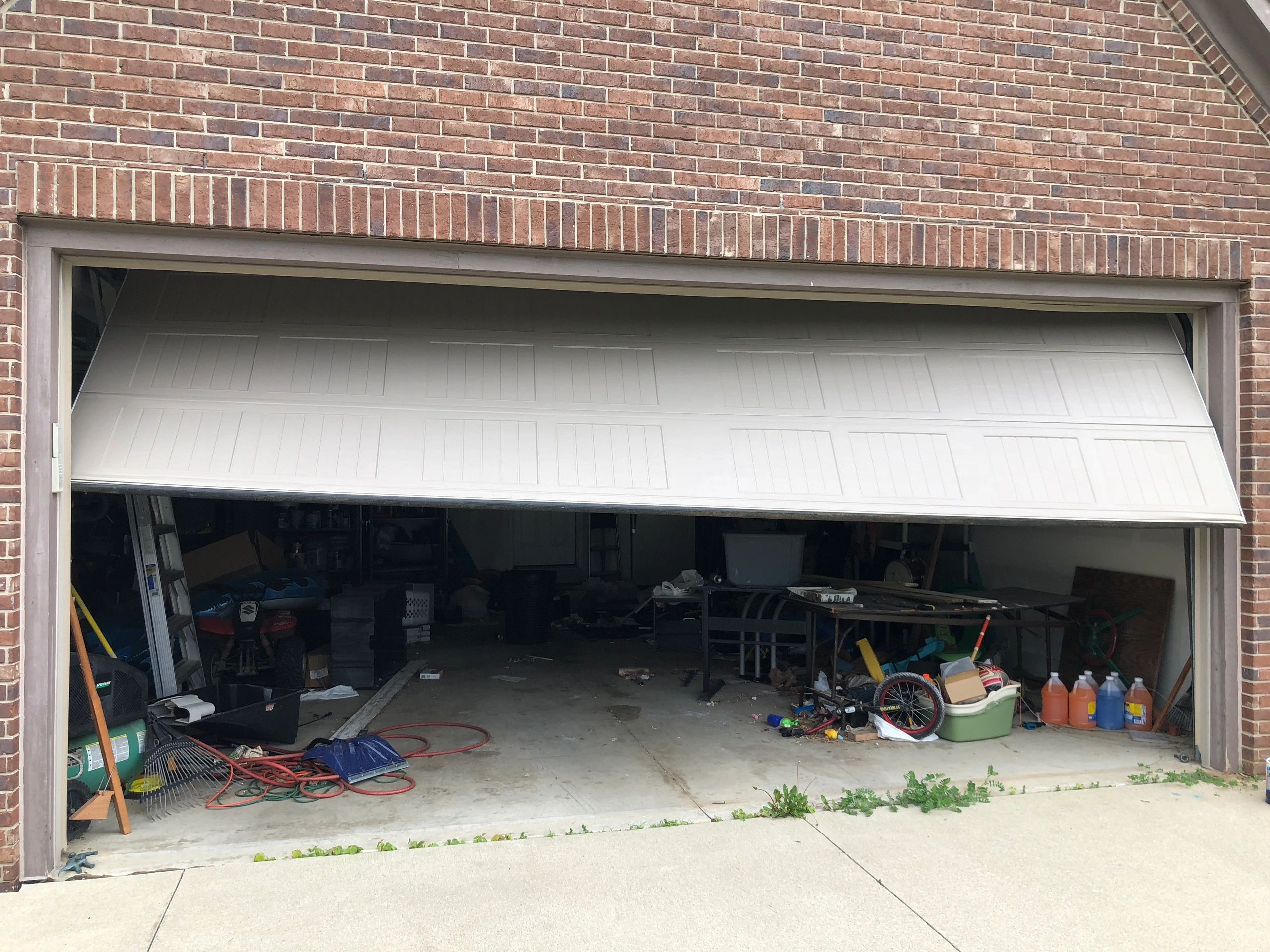 Off-Track Garage Door: Is It Safe to Close?