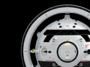 Top-down view of a circular spacecraft module with detailed components and labels.