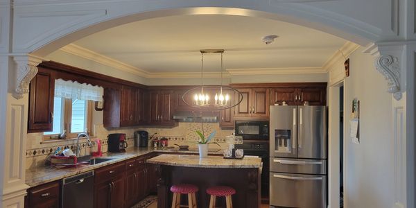 Kitchen and decorated arch molding