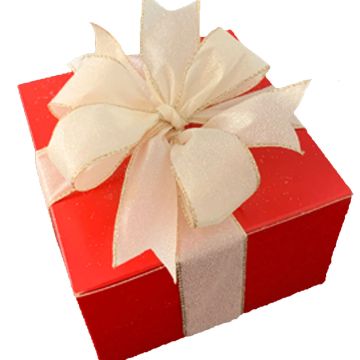 Red gift box with a white ribbon bow.