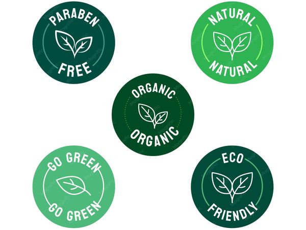 Green eco-friendly product labels with leaf icons