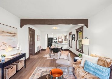 Bright living room and dining area with modern decor.