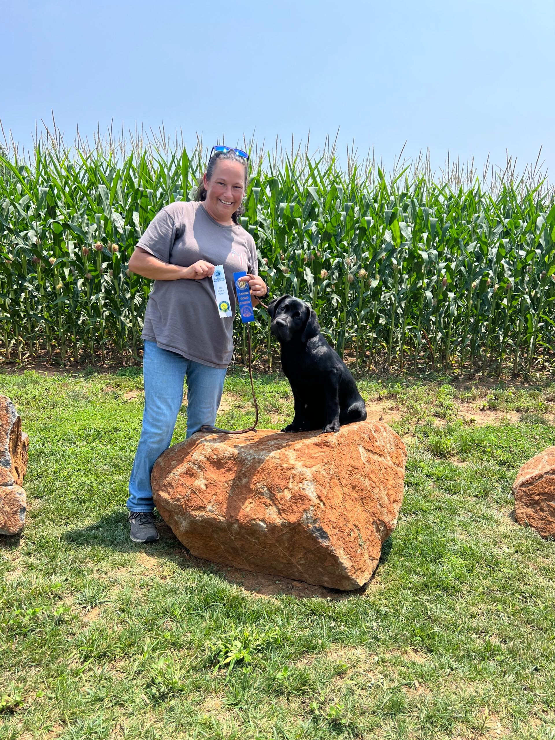 Nicole with her newest pup Kali, who earned her AKC Star Puppy & CGC! #akcevaluator #goodcitizen