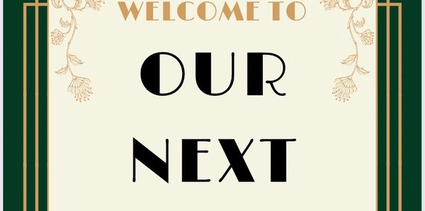 Welcome sign with elegant floral design and bold text.
