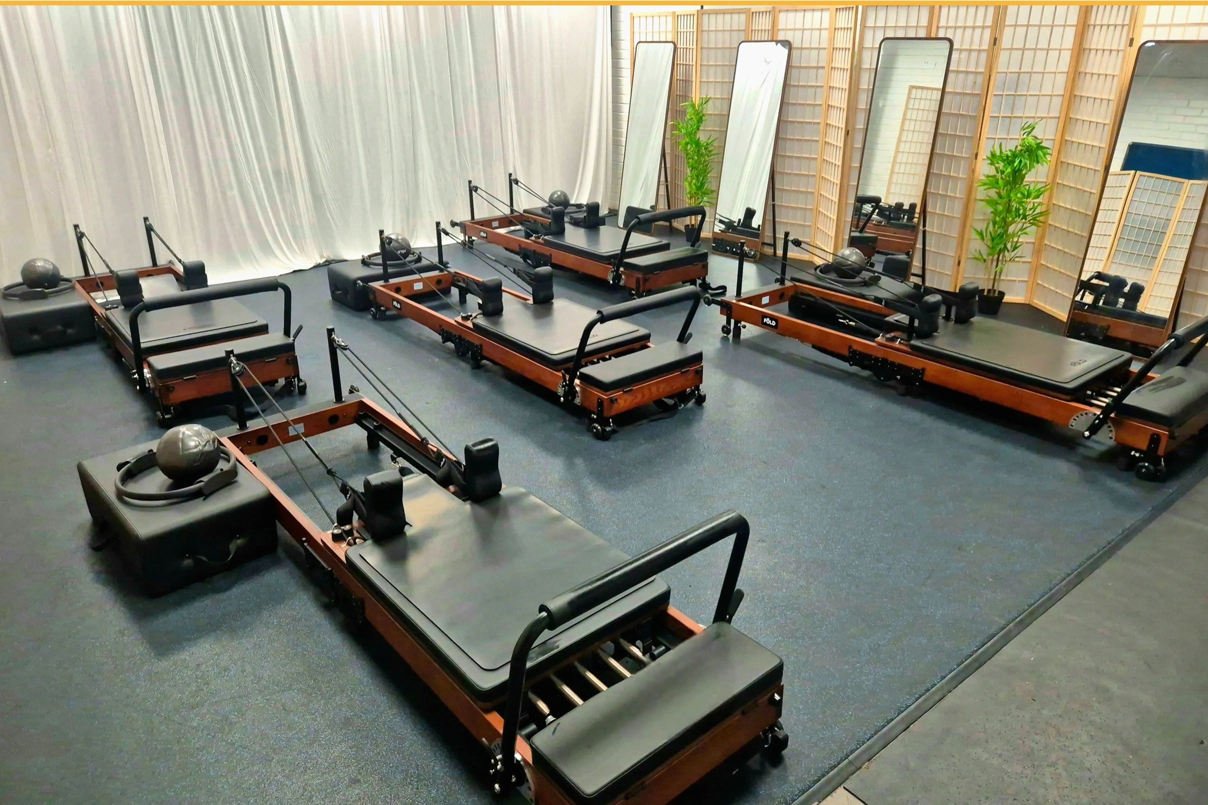 Five reformer beds in a small boutique studio in Dulwich College, London SE21 7LE