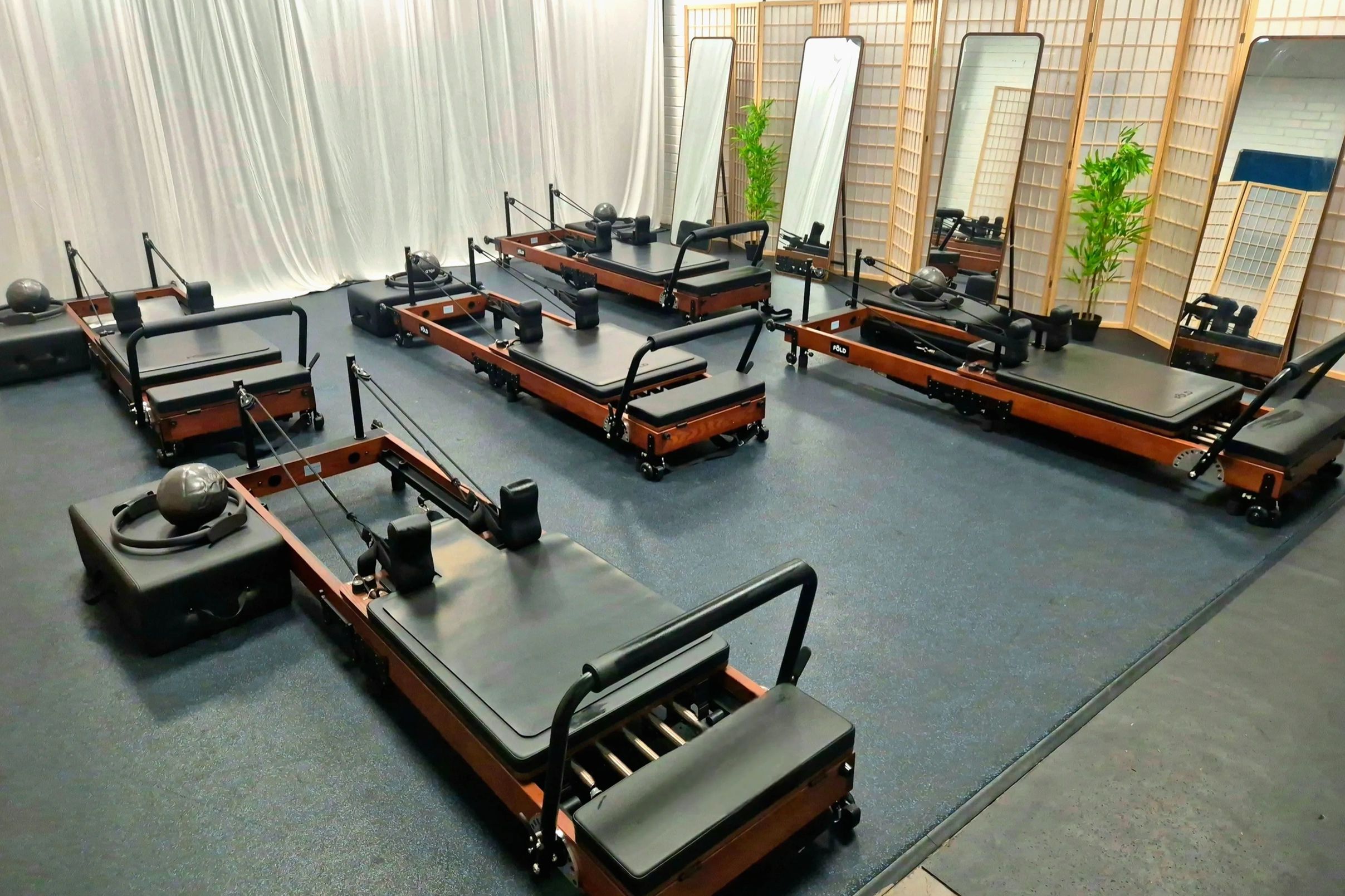 Five reformer beds in a small boutique studio in Dulwich College, London SE21 7LE
