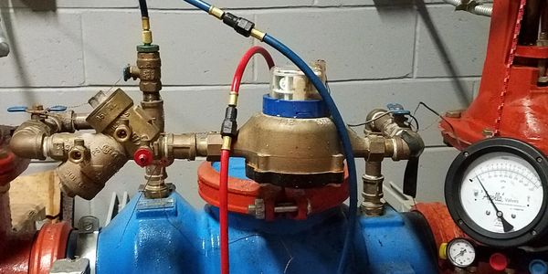 Backflow preventer with MidWest Test Kit