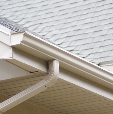 New seamless gutters installed by Arctic Roofing, ensuring durability and efficient water management