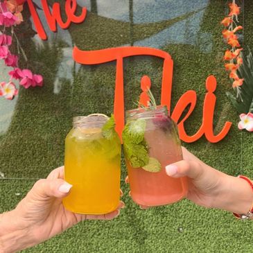 cocktails in mason jars clicking at Long Island's The Tiki @ Sunset Harbour, 