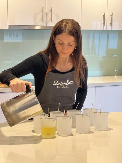 Lady pouring candles