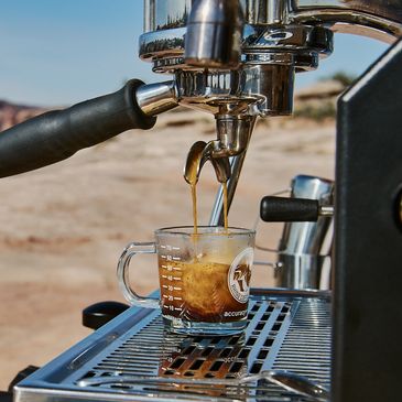 A close up of an espresso shot being pulled