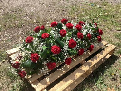 Large Red Rose Casket display.