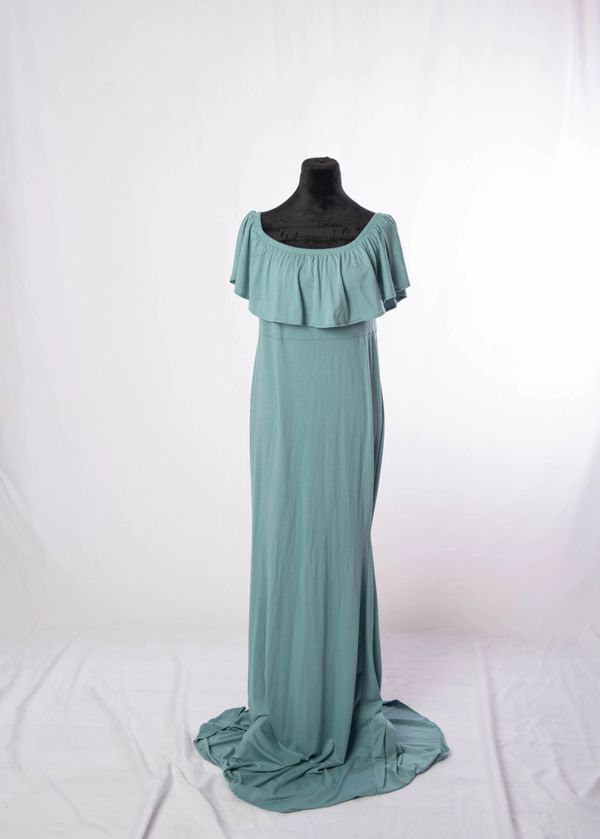 Elegant light blue off-shoulder maxi dress on a black mannequin.