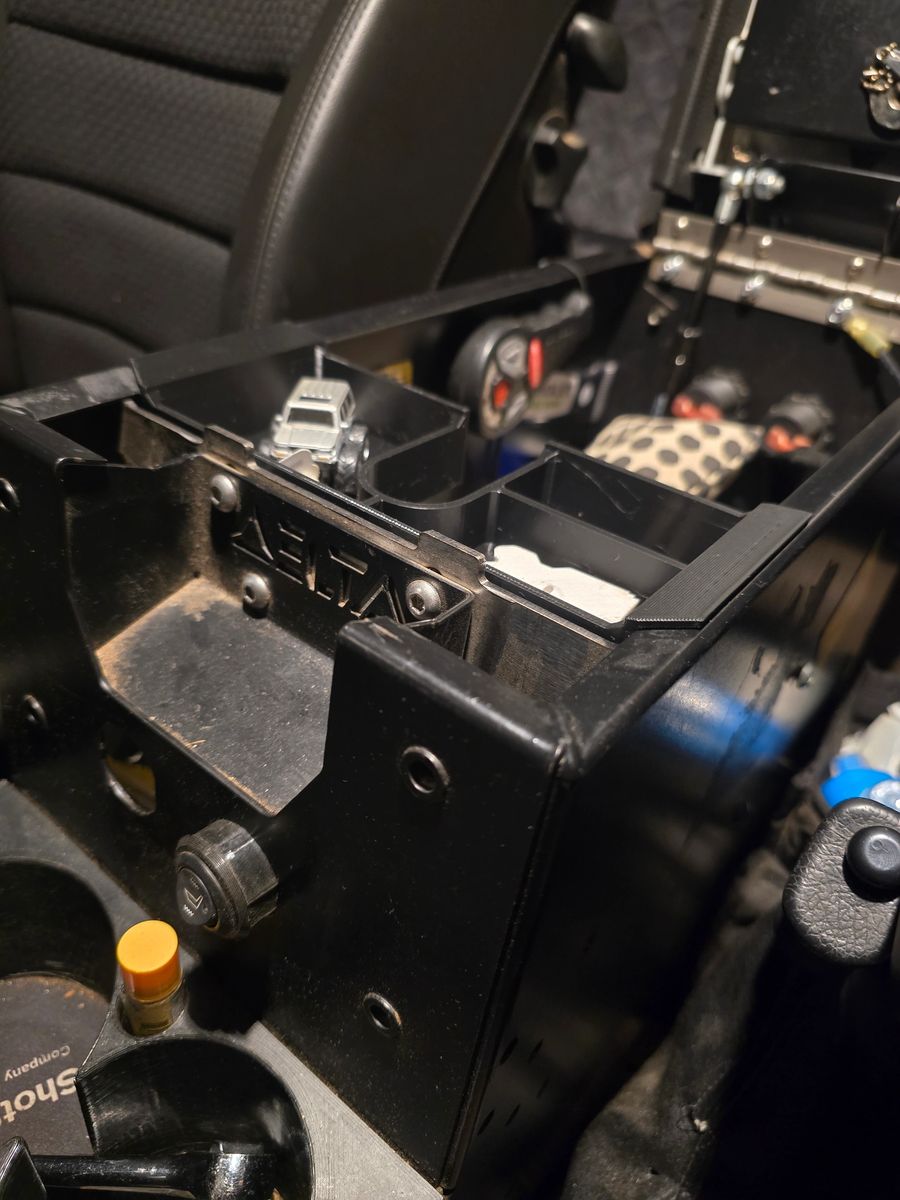 Delta console storage tray