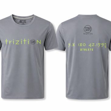 Gray athletic t-shirt with neon yellow 'trizition' branding and triathlon distances printed on front and back.