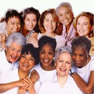 A diverse group of joyful older women smiling together.