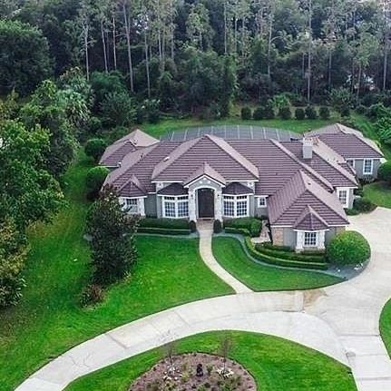 Roof replacement on a large home in Lake Mary, FL by O'John Roofing