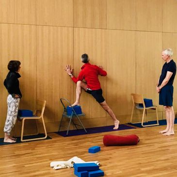 Yoga workshop practicing with props