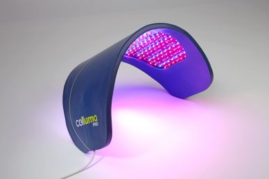 A sleek blue LED light therapy device emitting purple and red light.