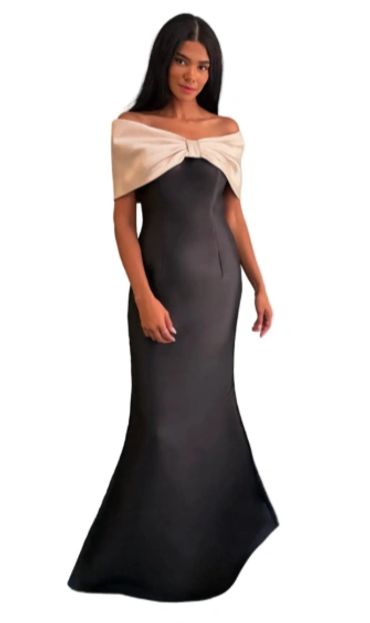 Elegant black gown with an off-shoulder beige bow detail.