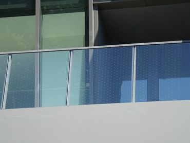 Balcony with glass railing with birdsafe etched glass