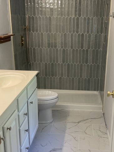 Replace old tub and tile with new tiled shower and floor