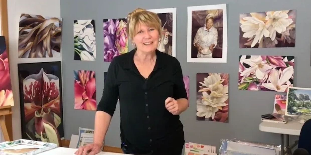 Birgit O’Connor presents her floral artwork during watercolor workshops in her studio.