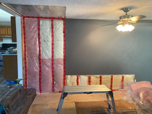 installing Insulation and vapor barrier
