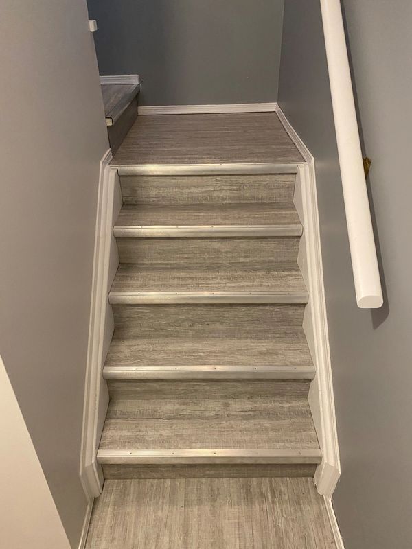 Changed from Carpet to Laminate flooring on stairs.