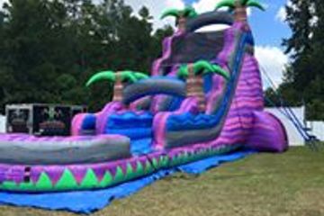 Purple single lane water slide. Giant water slide.