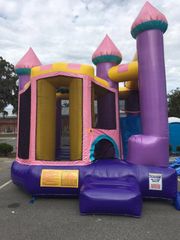 Sparkling pink castle combo bounce house.