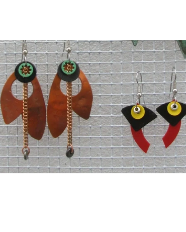 Sample of one-of-a-kind earrings. Copper, brass, and found objects. Metal has been textured, patinat