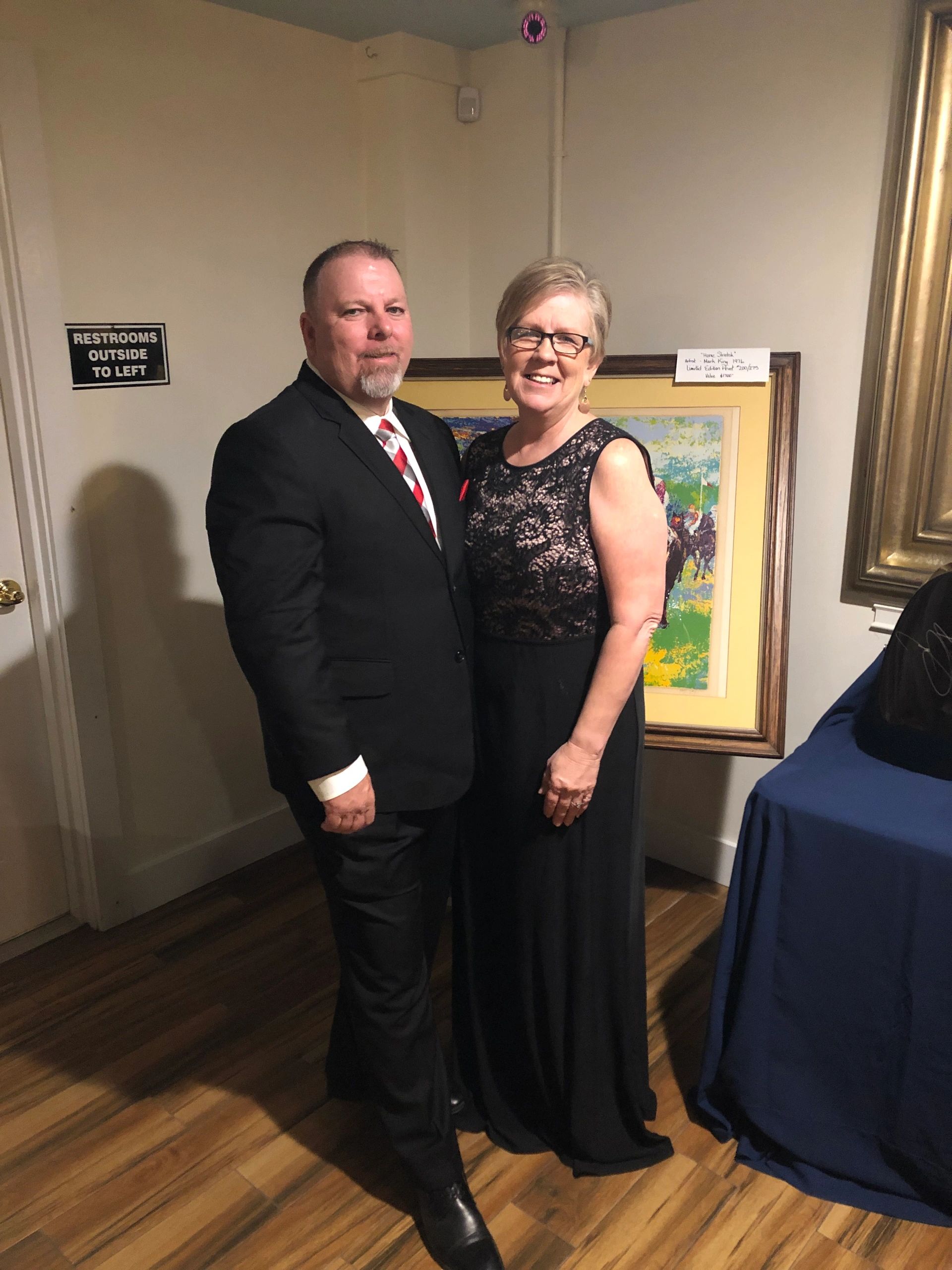 Man and woman in formal clothing