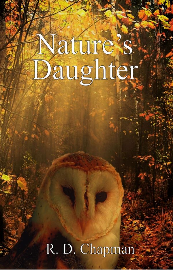 A white-faced owl staring out of a fall colored forest background