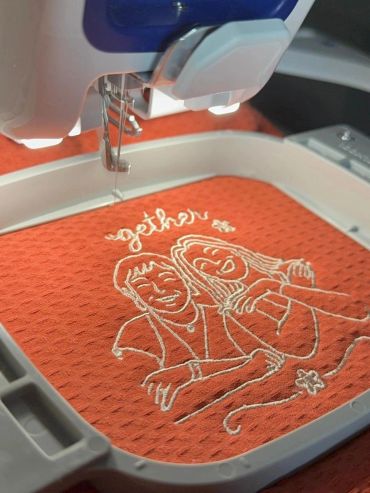 Embroidery machine stitching a couple illustration.