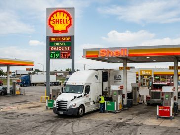 A truck refueling at a Shell gas station.