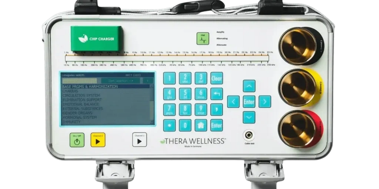 Thera Wellness device with screen, keypad, and three gold-colored dials.