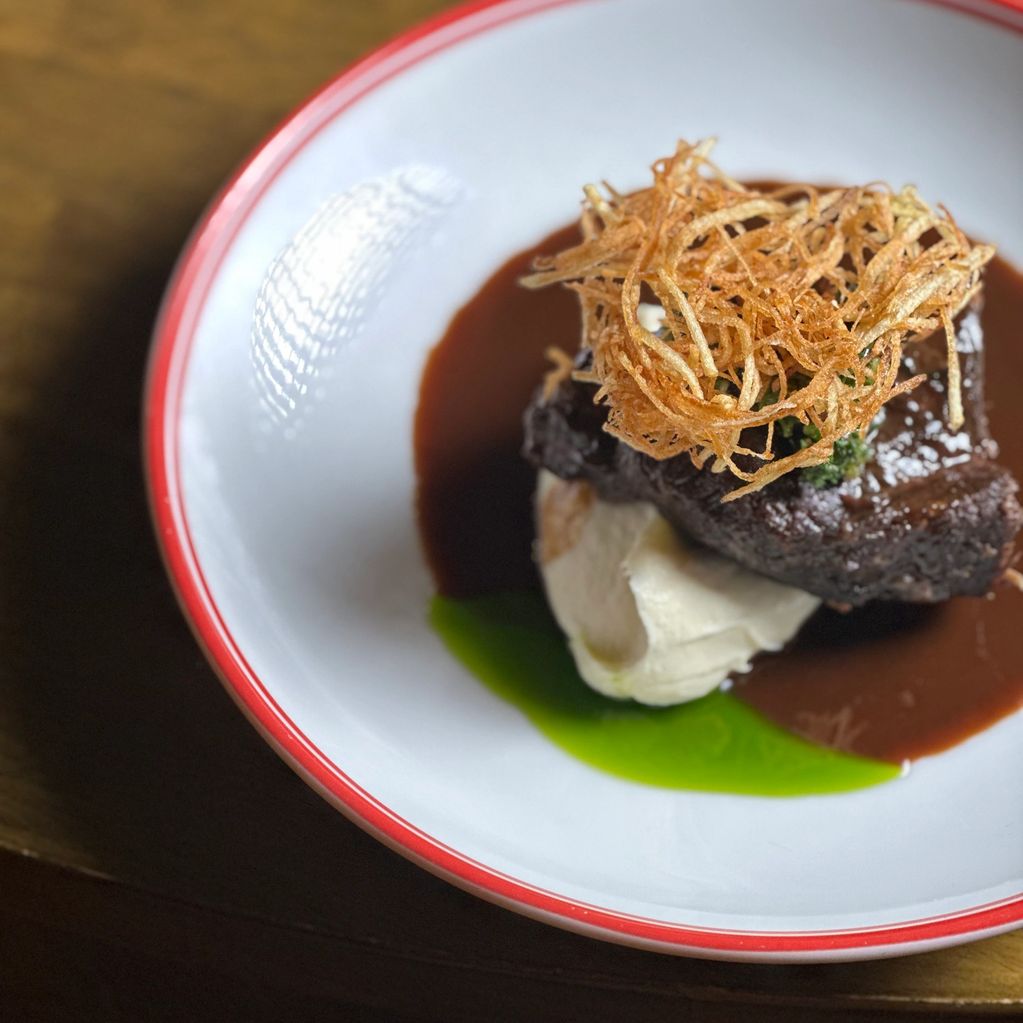 16 Hours slow cooked Beef Cheeks with Parsnip Purée, Parsley Oil, Crispy Potatoes and Red Wine Sauce