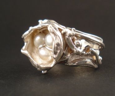 Pearls and silver nest ring.