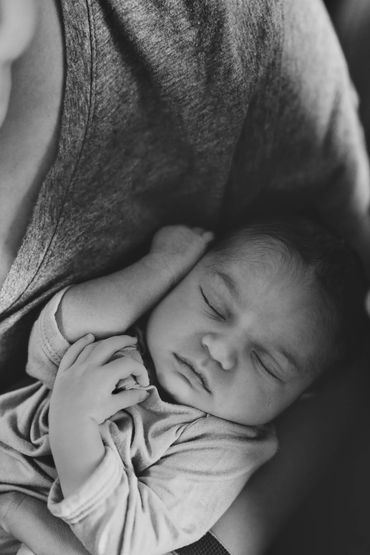 A mother holding her newborn